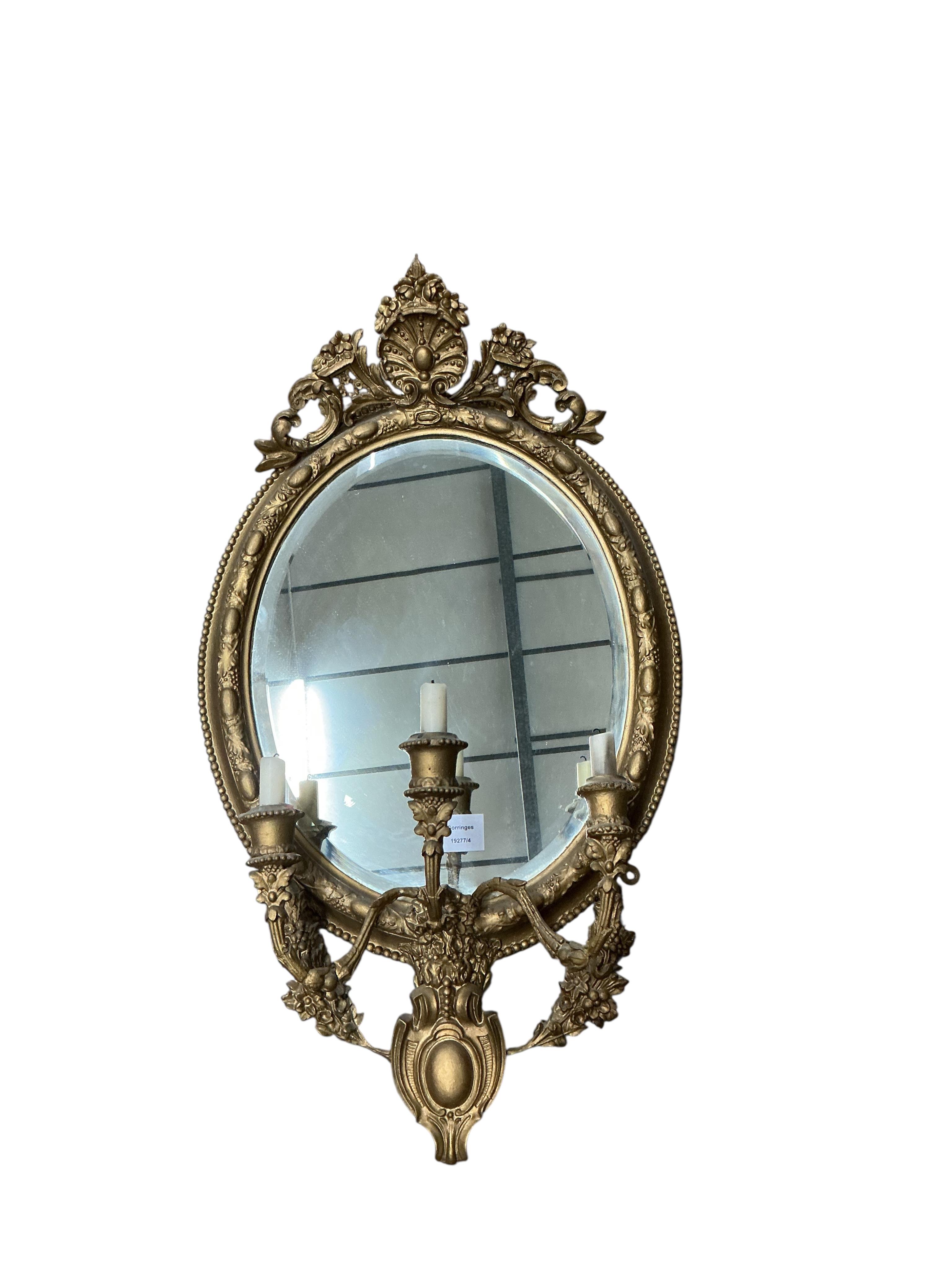 A Victorian giltwood and composition girandole wall mirror, re-painted, width 44cm, height 78cm